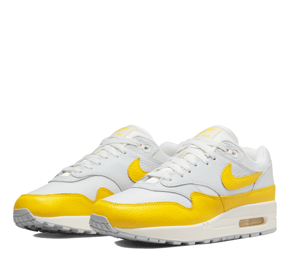 Grey and store yellow nike